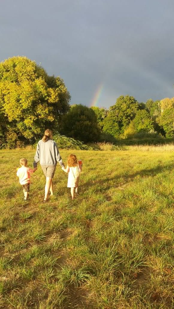 my family walking in a field